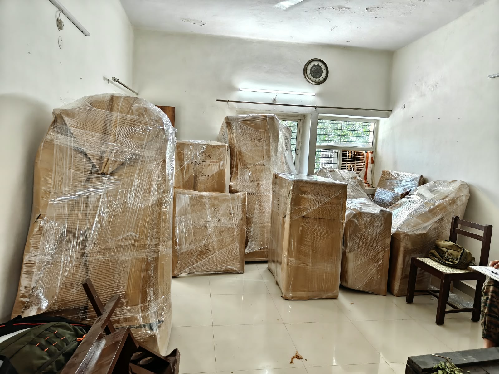 Household furniture carefully wrapped by Ganesh Packers and Movers